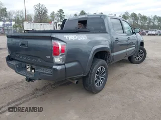 2023 Toyota Tacoma 4WD SR with VIN 3TMCZ5AN9PM538441, listed as a IAAI auction lot 41918710 with 1 mi miles. Bid and sale history available at carsss.com. Image 4.