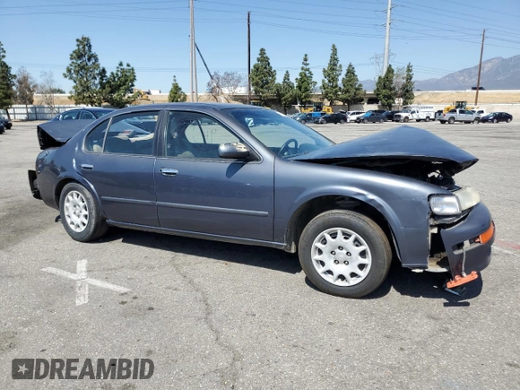 1999 Nissan Maxima GXE z VIN JN1CA21D9XM409448, wystawiony jako Copart lot #51822895 z przebiegiem Nie podano mil oraz Szkoda całkowita • Salvage title. Historia ofert i sprzedaży dostępna na DreamBid. Obrazek 4.