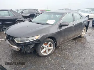 2010 Acura TSX with VIN JH4CU2F6XAC001938, listed as a IAAI auction lot 42647876 with 180,634 mi miles and . Bid and sale history available at DreamBid. Image 2.