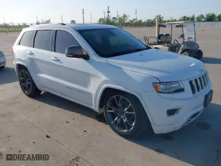 2014 Jeep Grand Cherokee Overland with VIN 1C4RJFCG6EC579985, listed as a IAAI auction lot 42025215 with 126,761 mi miles. Bid and sale history available at carsss.com. Image 1.