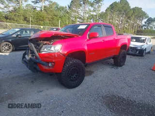 2020 Chevrolet Colorado 4WD Z71 with VIN 1GCGTDEN6L1215253, listed as a IAAI auction lot 42343032 with 61,632 mi miles and . Bid and sale history available at DreamBid. Image 2.