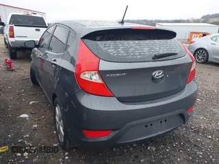 2012 Hyundai Accent SE with VIN KMHCU5AE9CU013458, listed as a IAAI auction lot 41475986 with 88,592 mi miles. Bid and sale history available at carsss.com. Image 3.