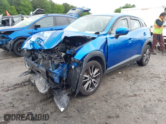 2017 Mazda CX-3 Touring z VIN JM1DKFC7XH0171860, wystawiony jako IAAI lot #42249818 z przebiegiem 54 873 mil mil oraz . Historia ofert i sprzedaży dostępna na DreamBid. Obrazek 19.