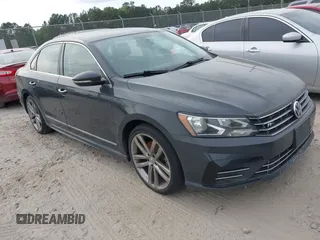 2016 Volkswagen Passat S with VIN 1VWAT7A37GC042880, listed as a IAAI auction lot 42092850 with 215,267 mi miles and . Bid and sale history available at DreamBid. Image 1.