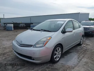 2007 Toyota Prius z VIN JTDKB20U173284944, wystawiony jako IAAI lot #42343170 z przebiegiem 172 776 mil mil oraz . Historia ofert i sprzedaży dostępna na DreamBid. Obrazek 2.
