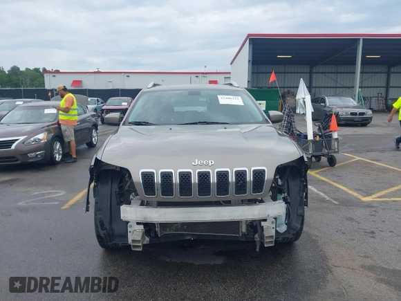 2019 Jeep Cherokee Latitude z VIN 1C4PJLCB2KD120503, wystawiony jako IAAI lot #42206232 z przebiegiem 115 714 mil mil oraz . Historia ofert i sprzedaży dostępna na DreamBid. Obrazek 13.
