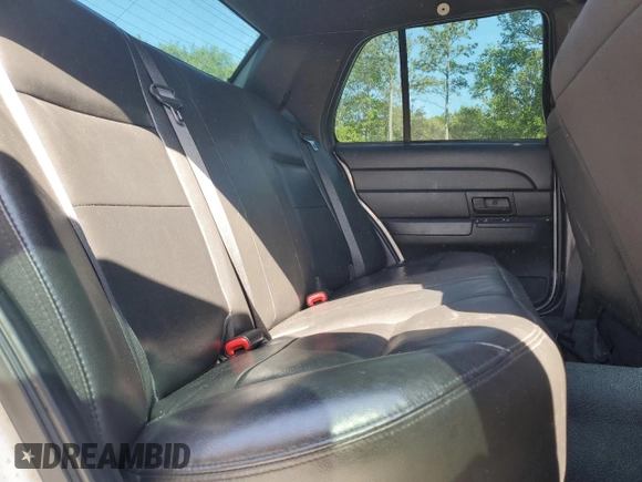 2010 Ford Police Interceptor with VIN 2FABP7BV7AX140870, listed as a Copart auction lot 53457275 with 124,194 mi miles and Salvage title. Bid and sale history available at DreamBid. Image 11.
