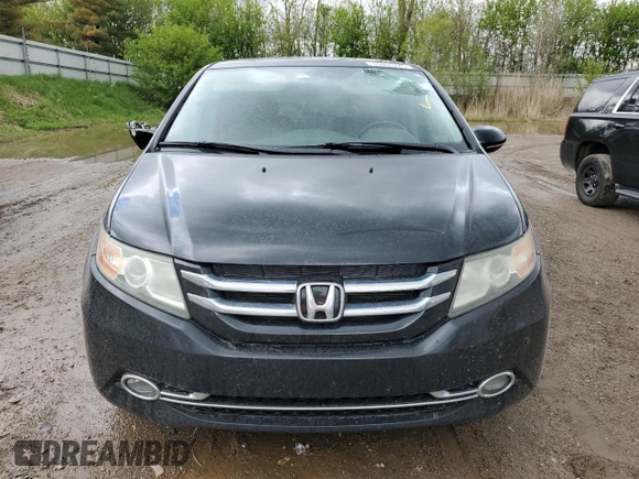 2014 Honda Odyssey Touring z VIN 5FNRL5H97EB508649, wystawiony jako Copart lot #55665245 z przebiegiem 162 892 mil mil oraz Czysty tytuł • Clean title. Historia ofert i sprzedaży dostępna na DreamBid. Obrazek 5.