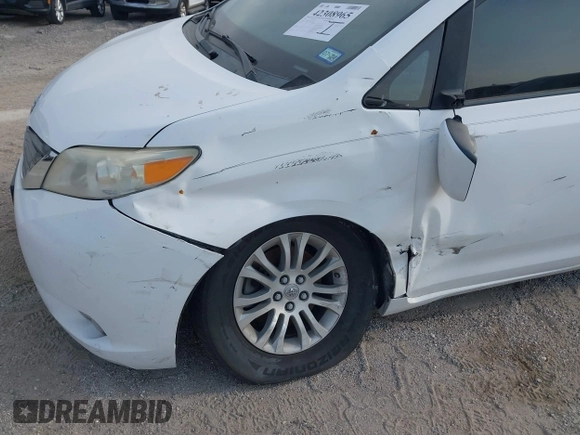 2011 Toyota Sienna XLE AAS with VIN 5TDYK3DC8BS108689, listed as a IAAI auction lot 42308965 with 179,524 mi miles and . Bid and sale history available at DreamBid. Image 6.