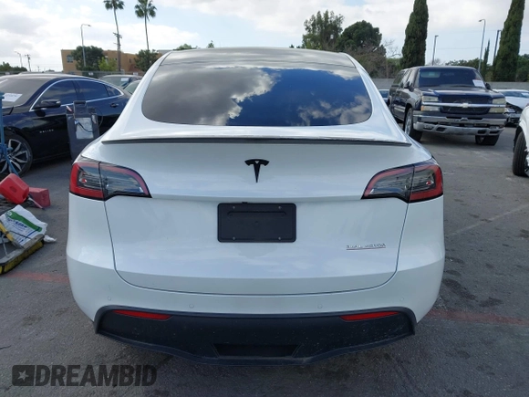 2022 Tesla Model Y Performance with VIN 7SAYGDEF1NF559572, listed as a IAAI auction lot 41516070 with 43,240 mi miles and . Bid and sale history available at DreamBid. Image 15.