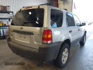 2006 Ford Escape XLT with VIN 1FMCU93126KC12711, listed as a IAAI auction lot 42659618 with 180,611 mi miles and . Bid and sale history available at DreamBid. Image 4.