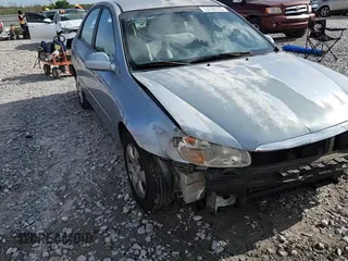 2007 Kia Spectra EX with VIN KNAFE121075394066, listed as a Copart auction lot 63238165 with 234,287 mi miles and Salvage title. Bid and sale history available at DreamBid. Image 13.