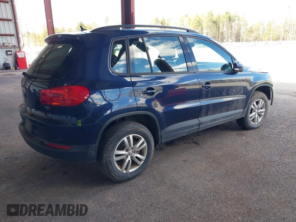 2016 Volkswagen Tiguan S with VIN WVGAV7AX5GW584747, listed as a IAAI auction lot 41853488 with 92,579 mi miles and . Bid and sale history available at DreamBid. Image 4.