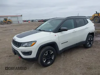 2018 Jeep Compass Trailhawk with VIN 3C4NJDDB7JT144431, listed as a IAAI auction lot 41629703 with 122,079 mi miles and . Bid and sale history available at carsss.com. Image 2.