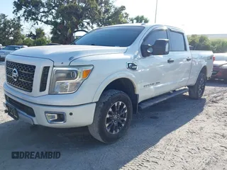 2016 Nissan Titan Platinum Reserve with VIN 1N6BA1F4XGN517905, listed as a IAAI auction lot 42676671 with 110,004 mi miles and . Bid and sale history available at DreamBid. Image 17.