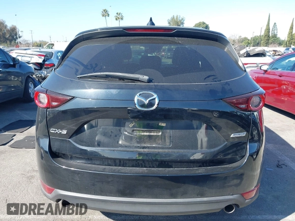 2017 Mazda CX-5 Touring with VIN JM3KFACL2H0146213, listed as a IAAI auction lot 41626112 with 77,829 mi miles and . Bid and sale history available at carsss.com. Image 16.