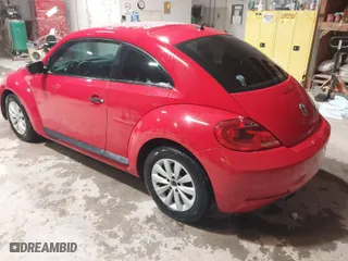 2016 Volkswagen Beetle Coupe 1.8T Wolfsburg Edition with VIN 3VWF17AT2GM619843, listed as a IAAI auction lot 41829023 with 147,716 mi miles. Bid and sale history available at carsss.com. Image 3.