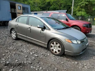 2006 Honda Civic LX z VIN 2HGFA165X6H518462, wystawiony jako Copart lot #59694195 z przebiegiem 101 556 mil mil oraz Czysty tytuł • Clean title. Historia ofert i sprzedaży dostępna na DreamBid. Obrazek 4.