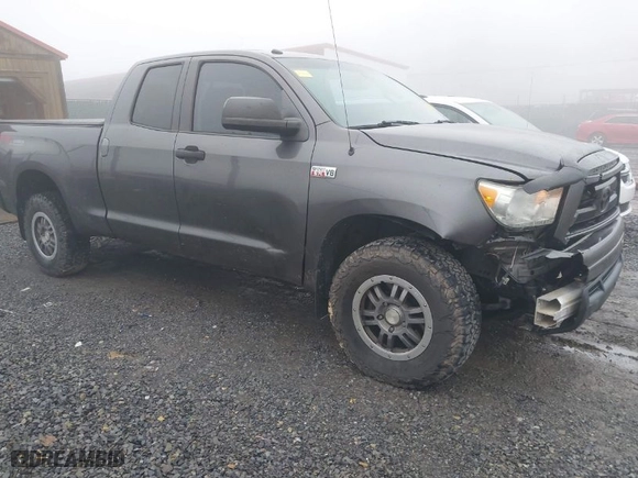 2012 Toyota Tundra 4WD Truck with VIN 5TFUY5F16CX260793, listed as a IAAI auction lot 41101239 with 202,339 mi miles. Bid and sale history available at carsss.com. Image 1.