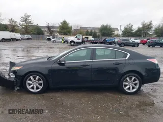 2012 Acura TL Auto z VIN 19UUA8F24CA004932, wystawiony jako IAAI lot #41078533 z przebiegiem 148 484 mil mil oraz . Historia ofert i sprzedaży dostępna na DreamBid. Obrazek 14.