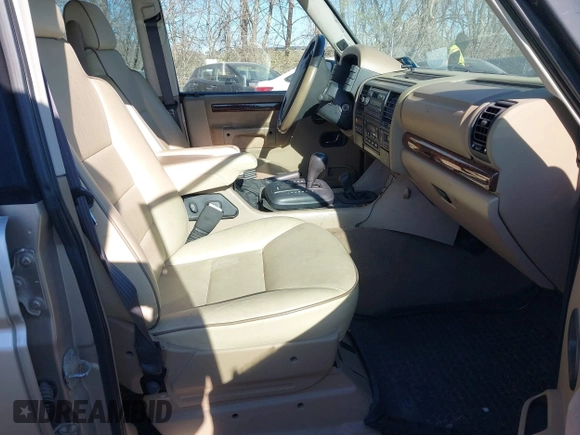 2000 Land Rover Discovery Cloth z VIN SALTY1247YA249969, wystawiony jako IAAI lot #41035905 z przebiegiem 188 643 mil mil oraz . Historia ofert i sprzedaży dostępna na DreamBid. Obrazek 5.
