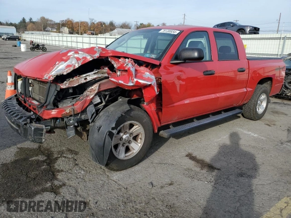 2008 Dodge Dakota SXT z VIN 1D7HW38KX8S542737, wystawiony jako Copart lot #78130834 z przebiegiem 60 496 mil mil oraz Szkoda całkowita • Salvage title. Historia ofert i sprzedaży dostępna na DreamBid. Obrazek 1.