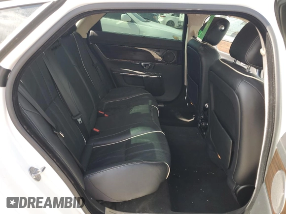 2014 Jaguar XJ with VIN SAJWA2GZ3E8V70365, listed as a Copart auction lot 42545995 with 65,649 mi miles and Salvage Title. Bid and sale history available at carsss.com. Image 10.