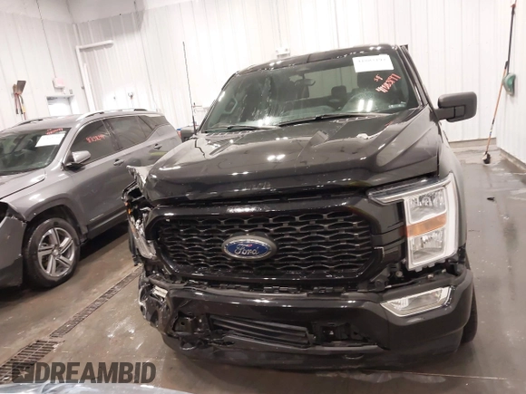 2021 Ford F-150 XL with VIN 1FTFW1E51MFD11166, listed as a IAAI auction lot 41883197 with 33,303 mi miles. Bid and sale history available at carsss.com. Image 13.