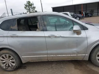 2017 Buick Envision Essence with VIN LRBFXBSA3HD098791, listed as a IAAI auction lot 41830140 with 80,302 mi miles and . Bid and sale history available at DreamBid. Image 13.
