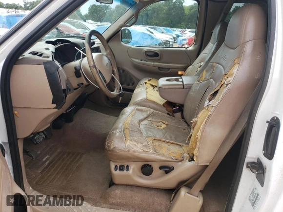 1999 Ford F-150 z VIN 1FTRX07W6XKA48100, wystawiony jako Copart lot #73209844 z przebiegiem Nie podano mil oraz Szkoda całkowita • Salvage title. Historia ofert i sprzedaży dostępna na DreamBid. Obrazek 7.