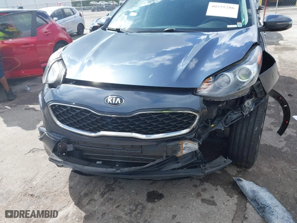 2020 Kia Sportage LX with VIN KNDPM3AC3L7713581, listed as a IAAI auction lot 40255286 with 90,221 mi miles. Bid and sale history available at carsss.com. Image 6.