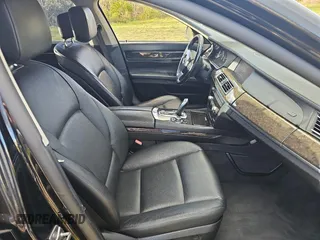 2012 BMW 7 Series 740i with VIN WBAKA4C52CC613791, listed as a Copart auction lot 82473894 with 132,656 mi miles and Clean Title. Bid and sale history available at carsss.com. Image 5.