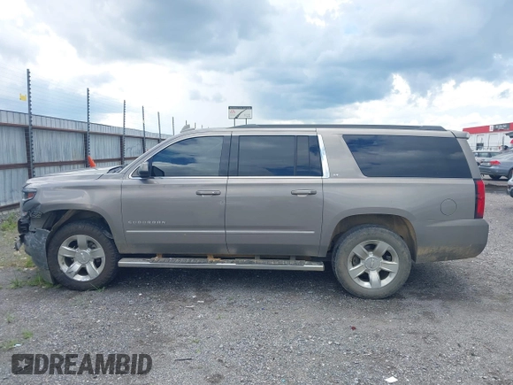 2017 Chevrolet Suburban LT with VIN 1GNSKHKC7HR356677, listed as a IAAI auction lot 42491581 with 129,496 mi miles and . Bid and sale history available at DreamBid. Image 14.