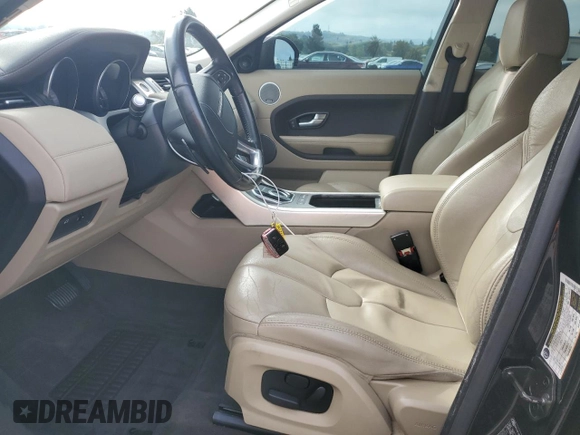 2015 Land Rover Range Rover Evoque Pure Plus с VIN SALVP2BG6FH076073, выставлен на аукционе Copart как лот 56125515 с пробегом 125 139 миль миль и Списание • Salvage title. История ставок и продаж доступна на DreamBid. Изображение 7.
