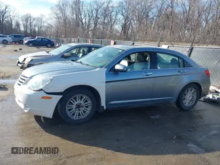 2008 Chrysler Sebring with VIN 1C3LC66J18N243827, listed as a IAAI auction lot 41642713 with 231,682 mi miles and . Bid and sale history available at DreamBid. Image 15.