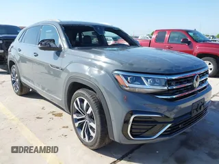 2023 Volkswagen Atlas SEL Premium R-Line z VIN 1V2FE2CA0PC224677, wystawiony jako IAAI lot #41991931 z przebiegiem 22 620 mil mil oraz . Historia ofert i sprzedaży dostępna na DreamBid. Obrazek 1.