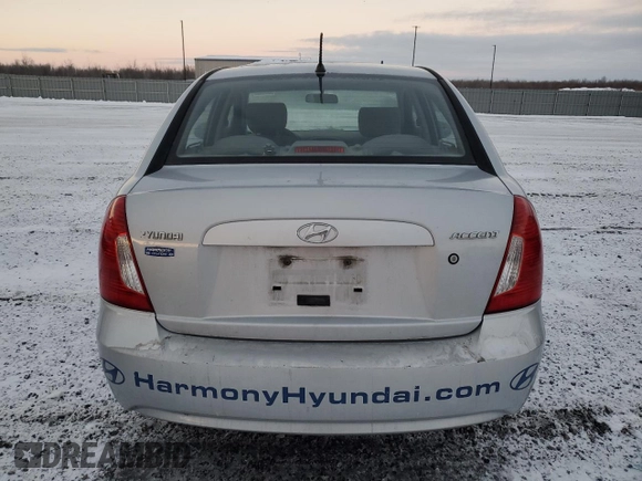 2007 Hyundai Accent GL z VIN KMHCN45CX7U127037, wystawiony jako Copart lot #86041984 z przebiegiem 212 828 mil mil oraz Szkoda całkowita • Salvage title. Historia ofert i sprzedaży dostępna na DreamBid. Obrazek 6.