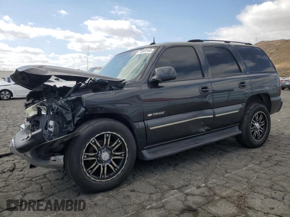 2003 Chevrolet Tahoe LT with VIN 1GNEC13TX3R293907, listed as a Copart auction lot 71849144 with 238,669 mi miles and Salvage Title. Bid and sale history available at carsss.com. Image 1.