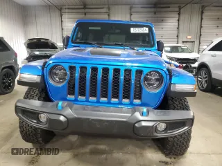 2022 Jeep Wrangler Unlimited Rubicon with VIN 1C4JJXR69NW190564, listed as a Copart auction lot 83703504 with 16,803 mi miles and Salvage title. Bid and sale history available at DreamBid. Image 5.