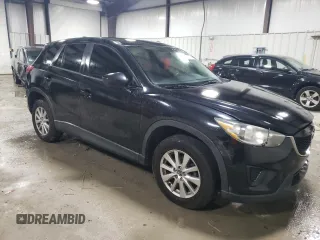2015 Mazda CX-5 Sport with VIN JM3KE4BE1F0447267, listed as a Copart auction lot 82527174 with Not provided miles and Clean title. Bid and sale history available at DreamBid. Image 4.