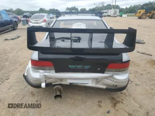 1995 Subaru Impreza with VIN GC8030988, listed as a Copart auction lot 70242354 with 123,696 mi miles and Salvage title. Bid and sale history available at DreamBid. Image 6.