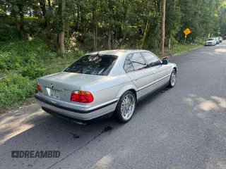 2000 BMW 7 Series 740i with VIN WBAGG8348YDN75777, listed as a Copart auction lot 65038165 with 119,506 mi miles and Clean title. Bid and sale history available at DreamBid. Image 4.