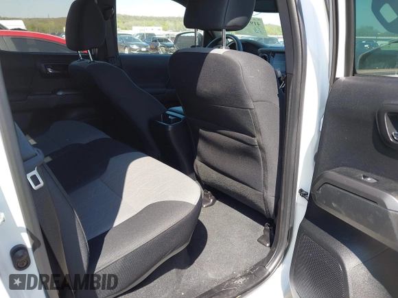 2023 Toyota Tacoma SR z VIN 3TYCZ5AN5PT151681, wystawiony jako IAAI lot #41936577 z przebiegiem 30 056 mil mil oraz . Historia ofert i sprzedaży dostępna na DreamBid. Obrazek 8.