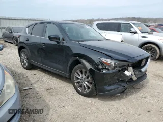 2021 Mazda CX-5 Grand Touring with VIN JM3KFBDM6M0401517, listed as a Copart auction lot 51019645 with 55,906 mi miles and Salvage Title. Bid and sale history available at DreamBid. Image 4.