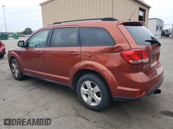 2012 Dodge Journey SXT with VIN 3C4PDDBG1CT241674, listed as a Copart auction lot 65224625 with 205,143 mi miles and Salvage title. Bid and sale history available at DreamBid. Image 2.