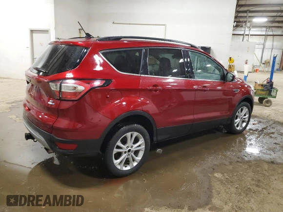 2018 Ford Escape SE z VIN 1FMCU9GD6JUB41465, wystawiony jako Copart lot #51332725 z przebiegiem 170 510 mil mil oraz Czysty tytuł • Clean title. Historia ofert i sprzedaży dostępna na DreamBid. Obrazek 3.