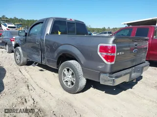 2014 Ford F-150 XL with VIN 1FTMF1CM3EFC57890, listed as a IAAI auction lot 41908369 with 228,743 mi miles. Bid and sale history available at carsss.com. Image 3.