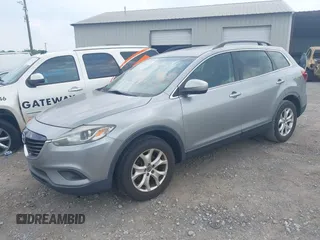 2013 Mazda CX-9 Sport with VIN JM3TB3BA2D0407491, listed as a IAAI auction lot 42430839 with 162,827 mi miles and . Bid and sale history available at DreamBid. Image 2.