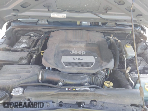 2015 Jeep Wrangler Freedom Edition with VIN 1C4AJWAG1FL714002, listed as a IAAI auction lot 42579024 with 98,732 mi miles and . Bid and sale history available at DreamBid. Image 10.