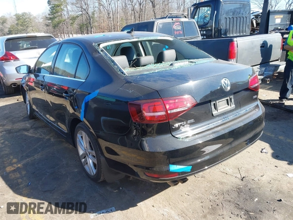2017 Volkswagen Jetta SEL z VIN 3VWL17AJ5HM246543, wystawiony jako IAAI lot #41650614 z przebiegiem 112 168 mil mil oraz . Historia ofert i sprzedaży dostępna na DreamBid. Obrazek 3.